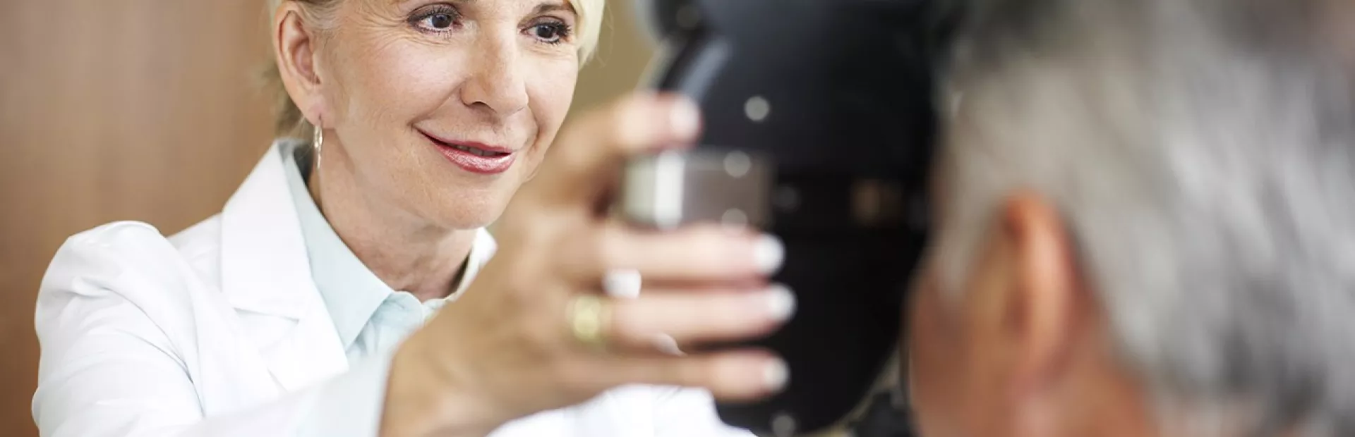 Doctor giving an eye exam