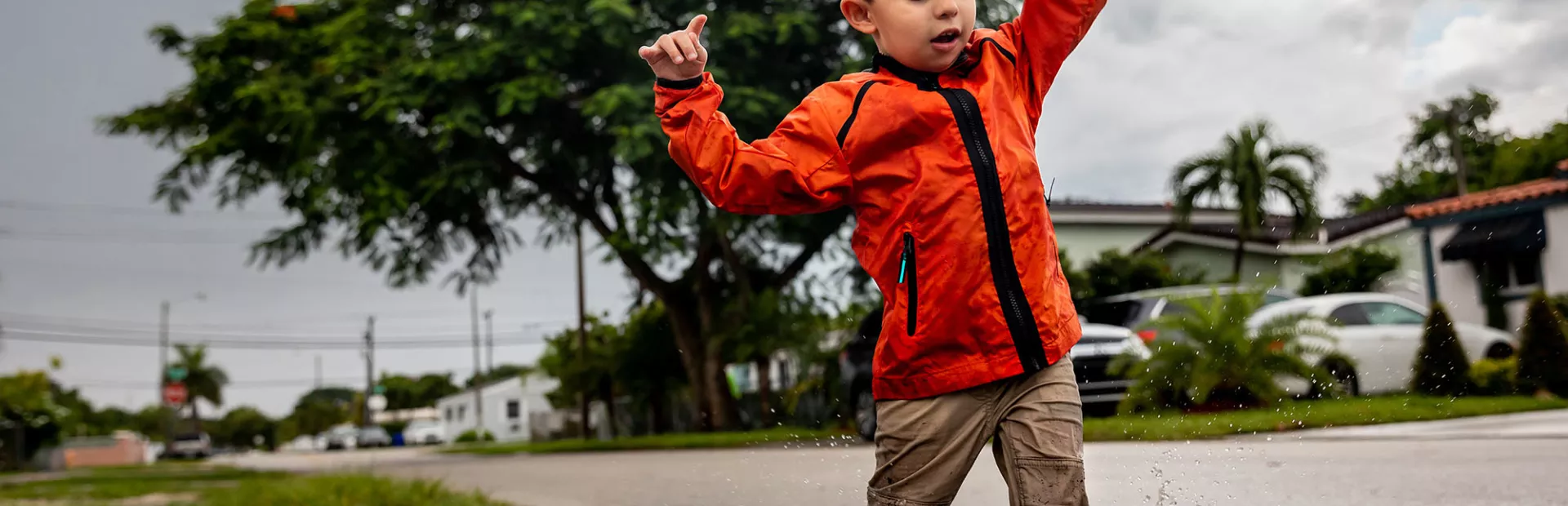 boy playing puddle flip