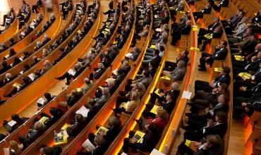 Large crowd in an auditorium on Basel campus