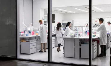 Scientists working in a lab at night
