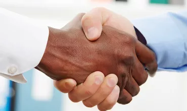 Two hands handshaking Two hands handshaking