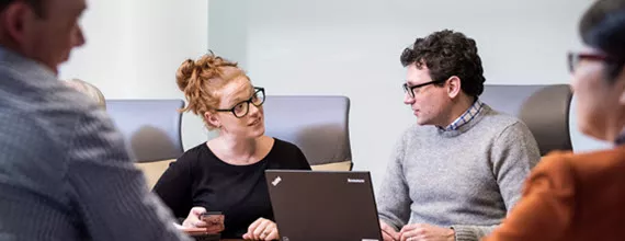 A group of Novartis associates in a meeting