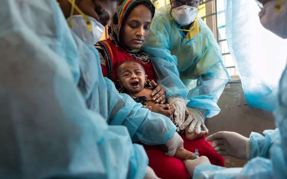 A blood sample is taken from Foysal at the clinic before he goes to the hospital, where he later recovered, thanks to antibiotics. A blood sample is taken from Foysal at the clinic before he goes to the hospital, where he later recovered, thanks to antibiotics.