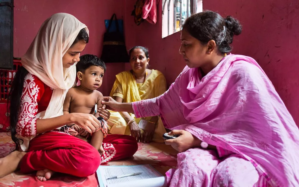 A field research assistant carries out routine checks to screen for pneumonia, the leading cause of death among young children worldwide. A field research assistant carries out routine checks to screen for pneumonia, the leading cause of death among young children worldwide.