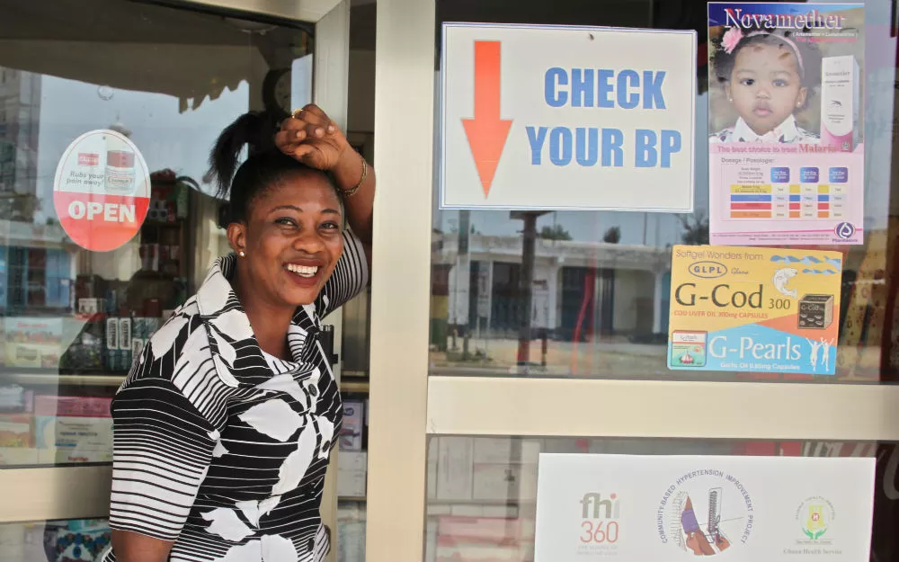 Shopkeeper in Ghana measuring blood pressure Dorothy is a licensed chemical seller involved in ComHIP.