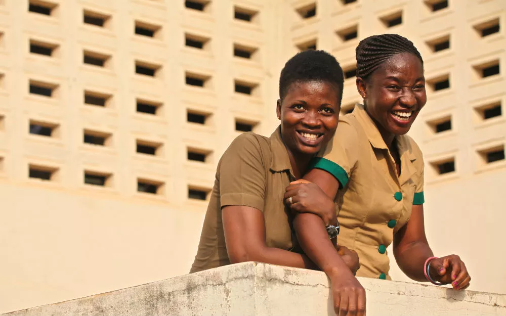 Smiling nurses in Ghana Two nurses involved in the ComHIP project