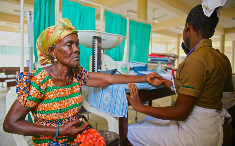Woman getting her blood pressure tested A woman at St. Martin’s Hospital has her blood pressure monitored.