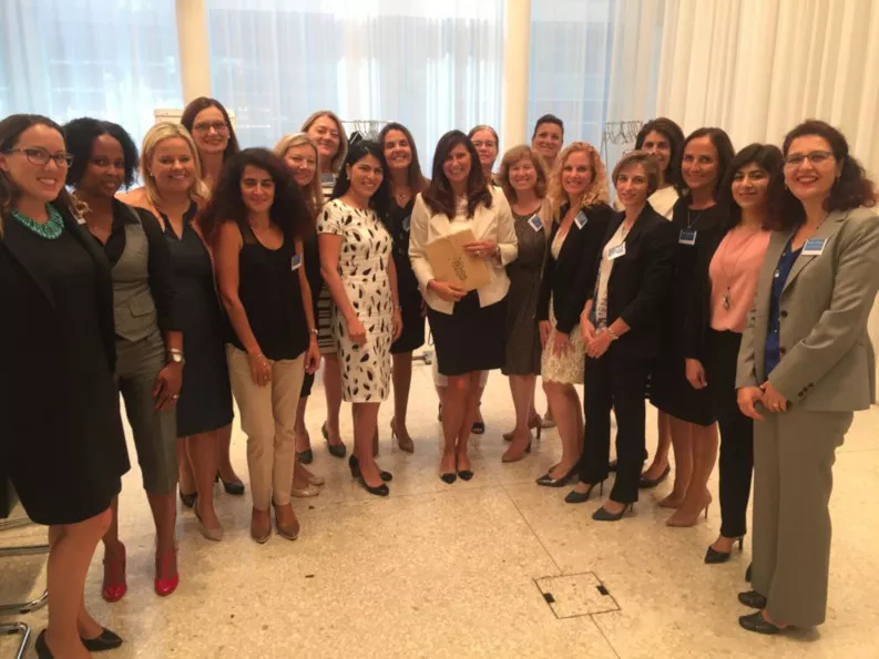 Schaffert at a women’s leadership program Schaffert with other attendees after a speech at a women’s leadership program