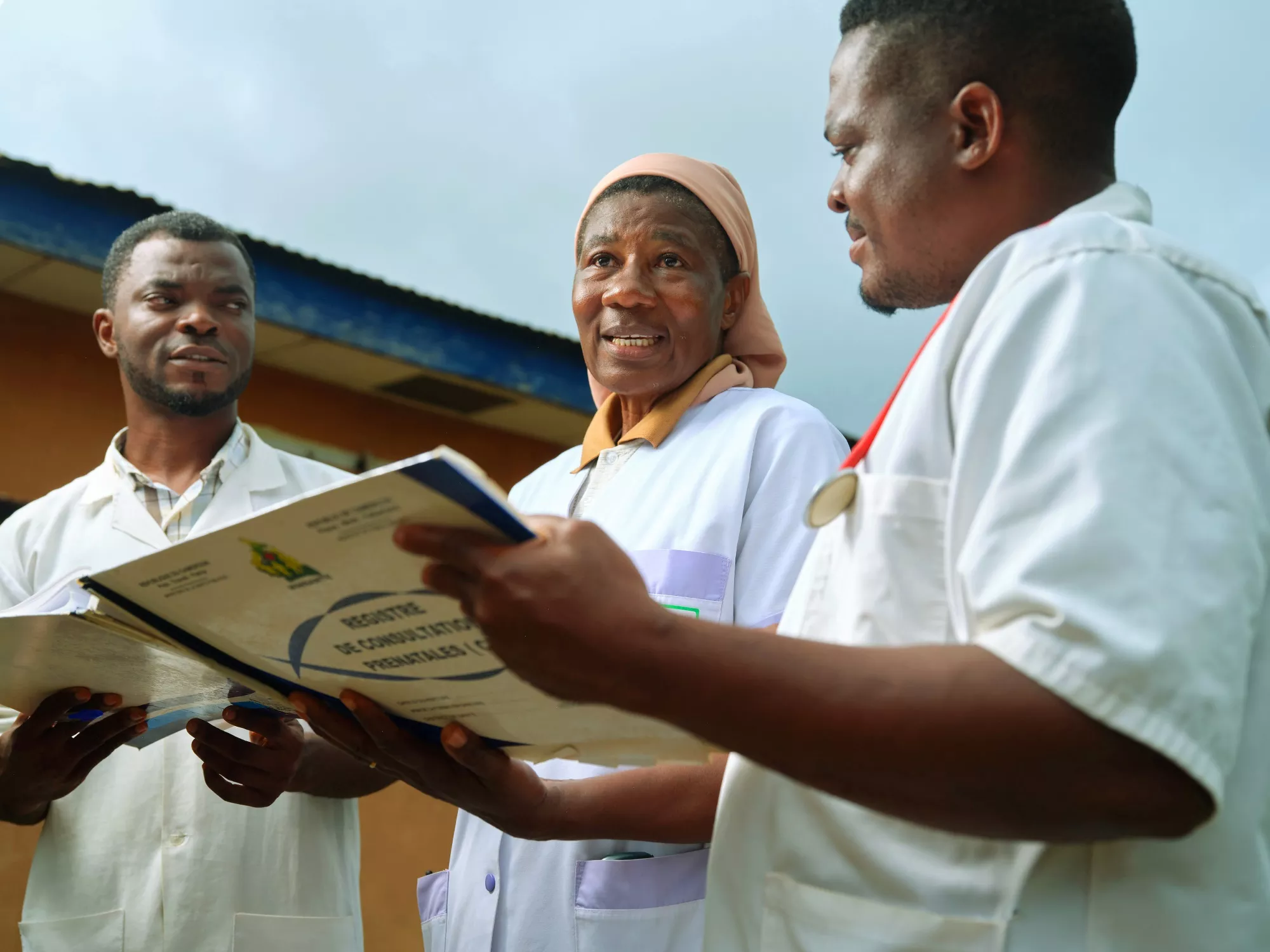 Sister Martine with nurses Thomas Ngue and Richard Bitomo at the Catholic mission’s health center in Ntui, in the Grand Mbam region of central Cameroon. Sister Martine with nurses Thomas Ngue and Richard Bitomo at the Catholic mission’s health center in Ntui, in the Grand Mbam region of central Cameroon.