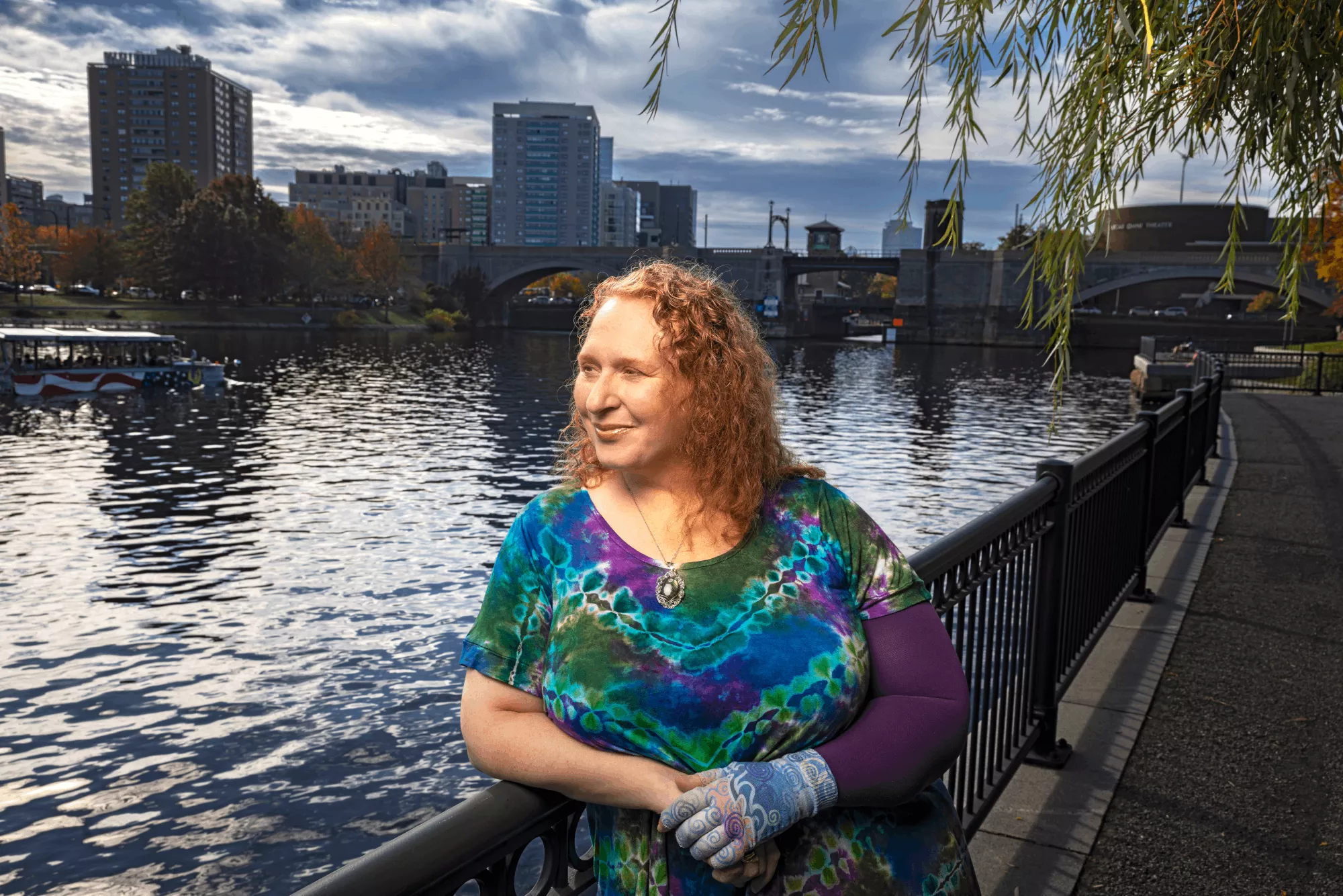 Laurie stands next to the Charles River in Boston. Laurie stands next to the Charles River in Boston.