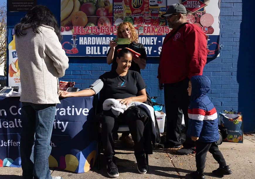 Maggie Perez (standing, center), a health educator in Philadelphia Maggie Perez (standing, center), a health educator in Philadelphia