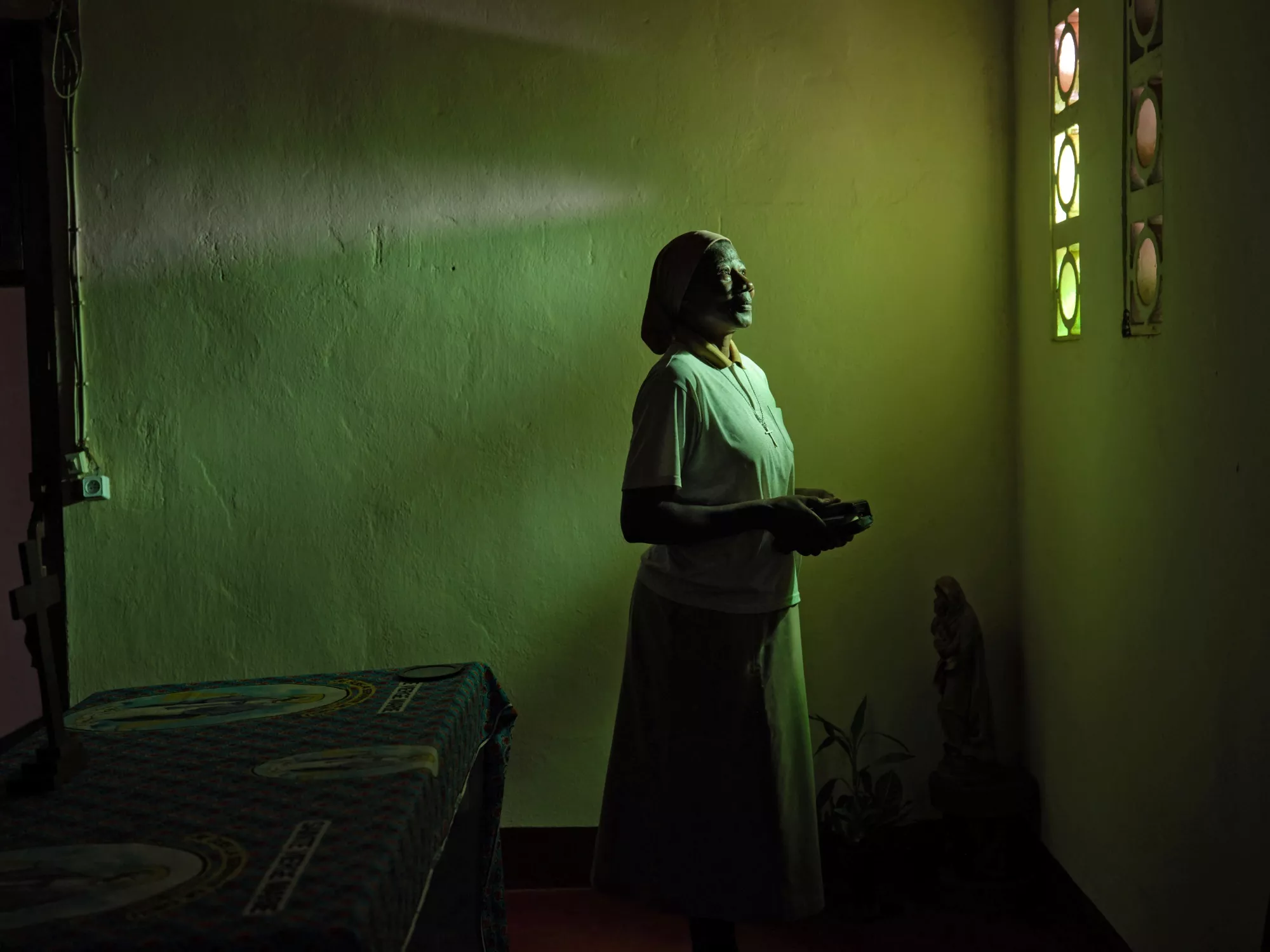 Sister Martine in a prayer room at the mission, where she has spent most of her life. Sister Martine in a prayer room at the mission, where she has spent most of her life.