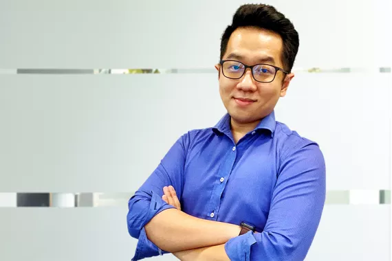 A portrait of Isaac, a Medical Lead at Novartis