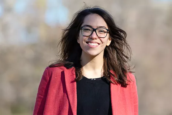 A portrait of Raundi, a Principal Scientist Oncology at Novartis