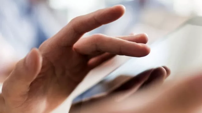 Man using digital tablet