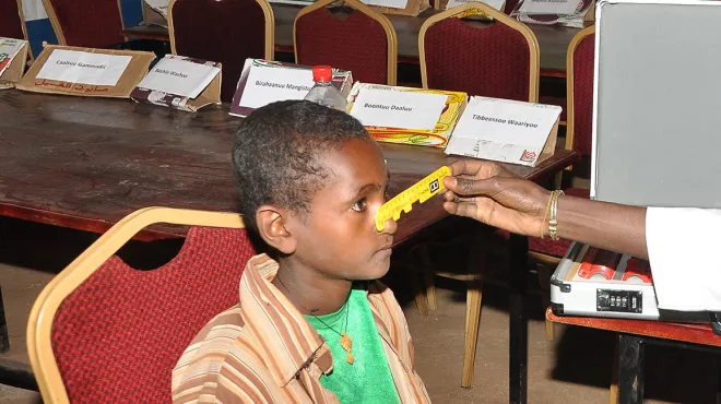 Teenager getting eyes tested