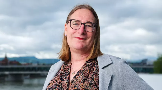 A portrait of Stephie, Global Head of diversity, equity, and inclusion, responsible for disability equity at Novartis