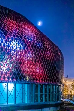 Illumination of zero-energy media facade of the Novartis Pavillon.